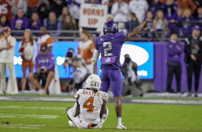 TCU Horned Frogs cornerback Josh Newton (2) celebrates a thread down stop against Texas Longhorns running back CJ Baxter (4) late in the fourth quarter of an NCAA college football game, Saturday, November. 11, 2023, at Amon G. Carter Stadium in Fort Worth, Texas.